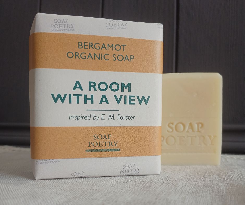 Bar of Bergamot Organic Soap with packaging labeled 'A Room with a View' by Soap Poetry on a neutral background.