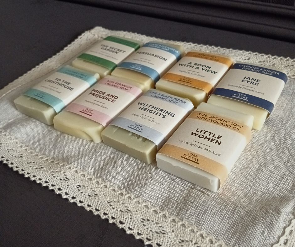 Set of dainty soaps with visible labels on a lace doily